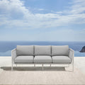 Armen Living Rhodes Outdoor Patio Sofa in Aluminum with Light Gray Rope and Cushions