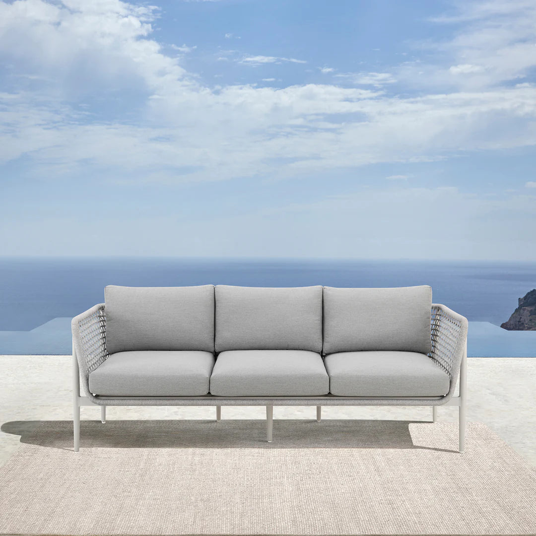 Armen Living Rhodes Outdoor Patio Sofa in Aluminum with Light Gray Rope and Cushions